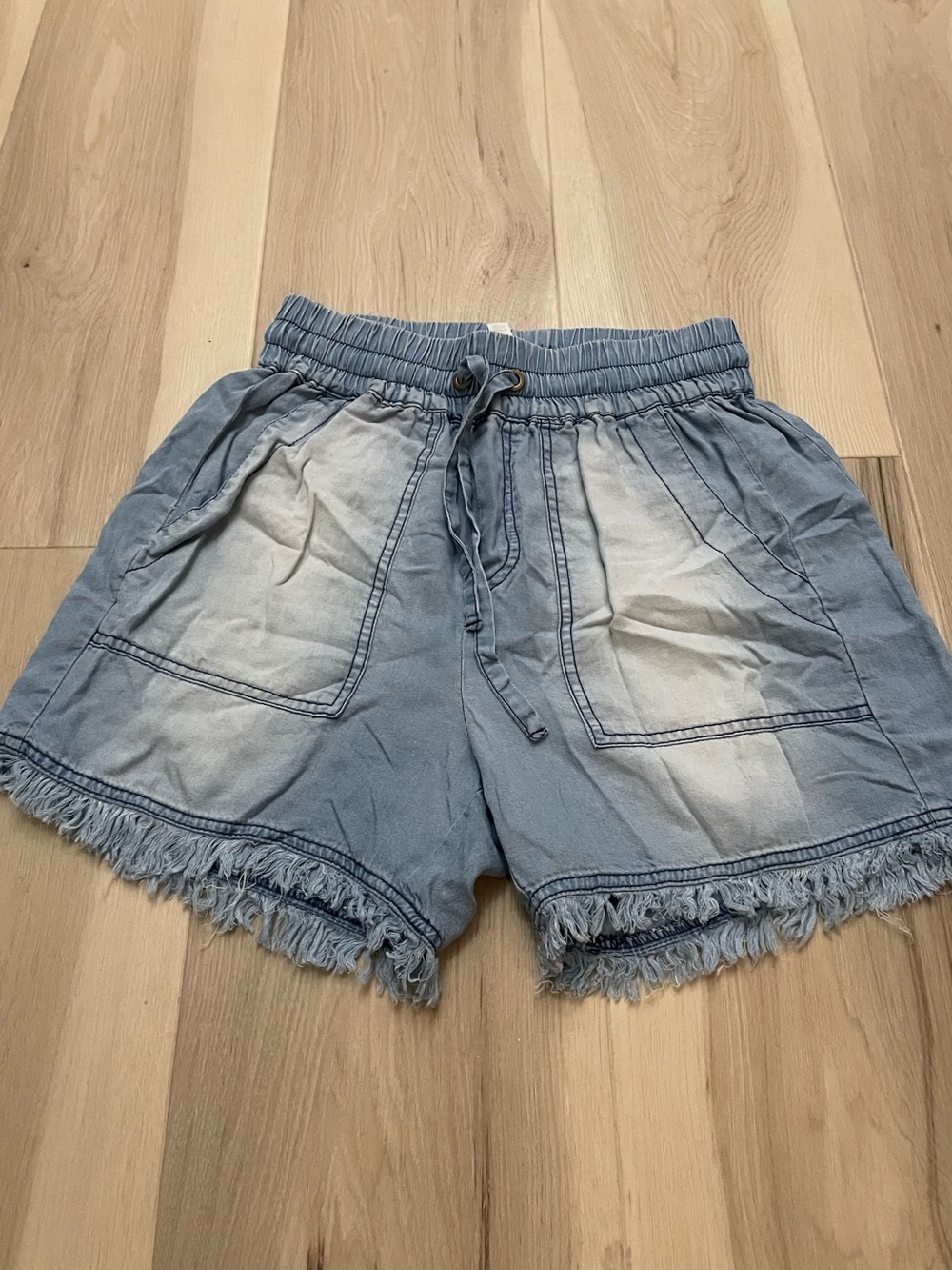 Zenana Light Wash Denim-Style Drawstring Fringe Shorts